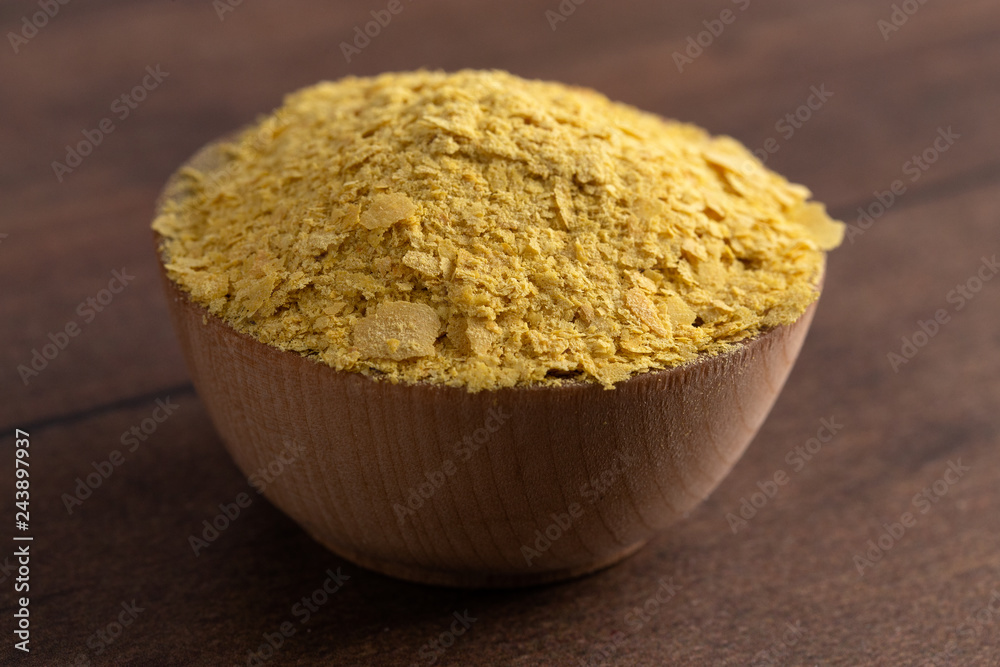 Flakes of Yellow Nutritional Yeast a Cheese Substitute and Seasoning for Vegan Diets Flakes of Yellow Nutritional Yeast a Cheese Substitute and Seasoning for Vegan Diets