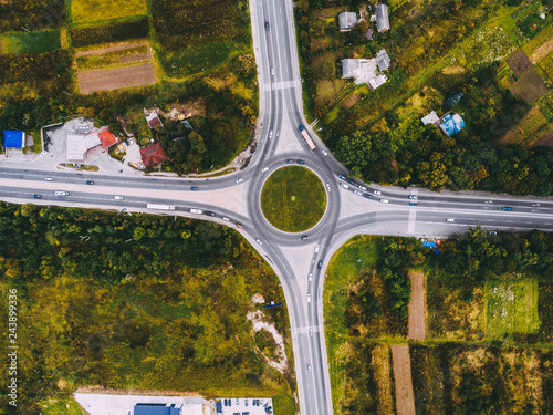 Aerial view Road roundabout with car lots.