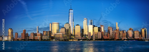 New York City Manhattan skyline panorama with urban skyscrapers at dusk