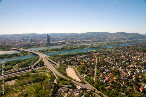 Architectural landscape second test aerial birds eye view of city skyline and roads with landscape and river Danube in clear blue sky background in Vienna Austria