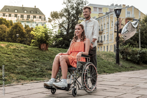 Charming young female sitting on her wheelchair © Viacheslav Yakobchuk
