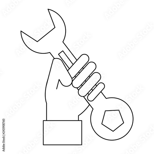 Hand holding wrench