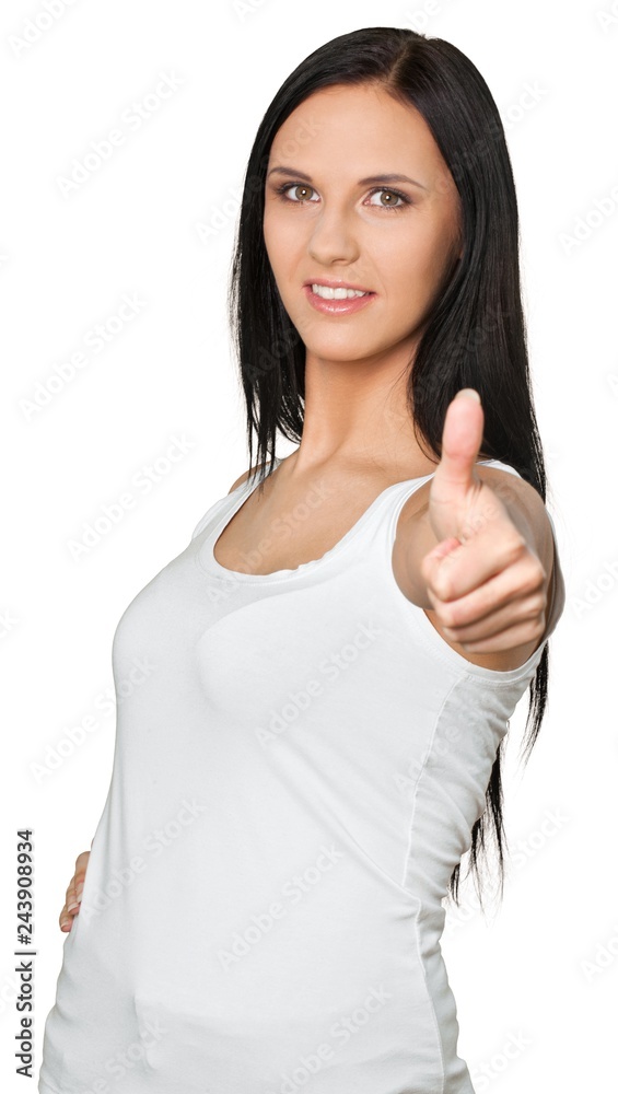 young woman giving a thumbs up young woman giving a thumbs up