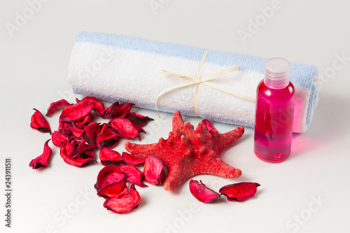 face towel, showergel and accessories for bathing and relaxing photo