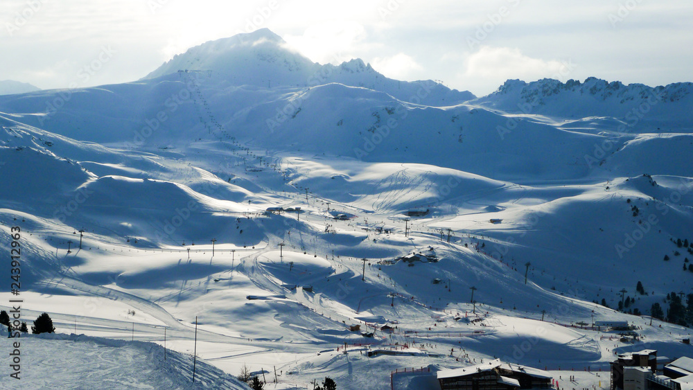 Panoramic view of the mountains and a large network of ski lifts in Les Arcs