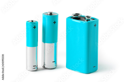 Blue AAA, AA and PP3 batteries, isolated on white background photo