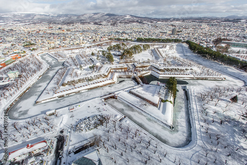 snow cityscape and star construction view from Goryokaku tower in Winter. Hakodate, Hokkaido, Japan photo
