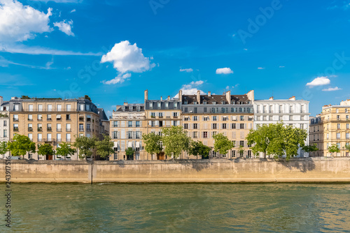 Paris, view of ile saint-louis and quai d'Orleans, beautiful buildings and quays in summer 