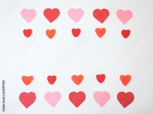 San Valentine´s hearts decorations made with red and pink papers and jelly beans and gummies