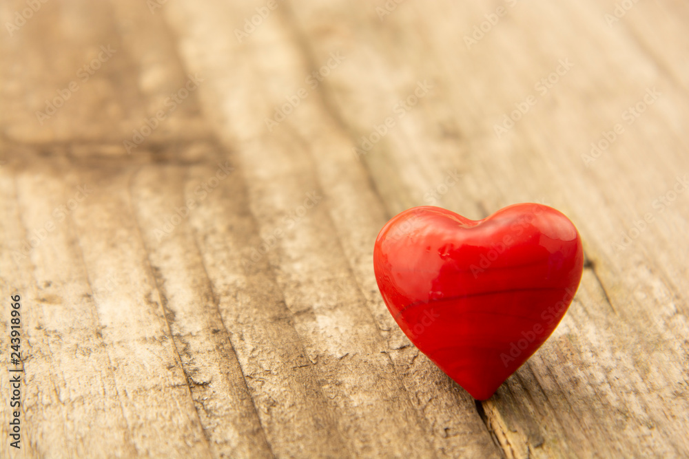 Two red hearts on wooden background, close-up, Valentine's day, celebrating love. Two red hearts on wooden background, close-up, Valentine's day, celebrating love.