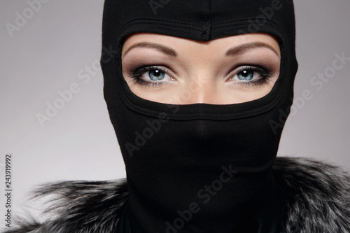Принти на полотні Beautiful woman in black biker's balaclava