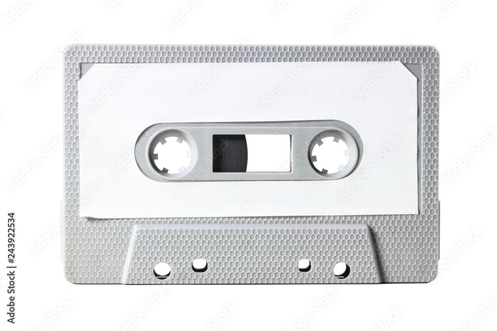 Obraz premium An old vintage cassette tape from the 1980s (obsolete music technology). Grey hexagon grid plastic body, white empty label.