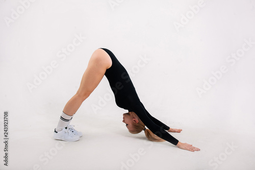 young athletic girl doing stretching