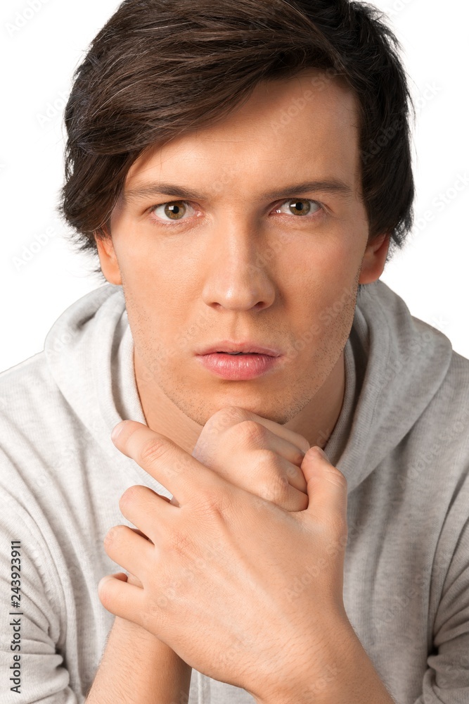 Portrait of young thoughtful man, isolated Portrait of young thoughtful man, isolated