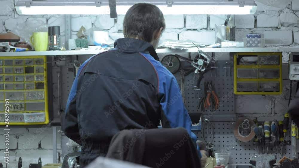 Repairman worth his work table. Workspace auto repair wizard Repairman worth his work table. Workspace auto repair wizard