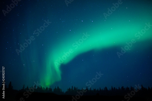 Aurora borealis as magical phenomenon of Northern sky