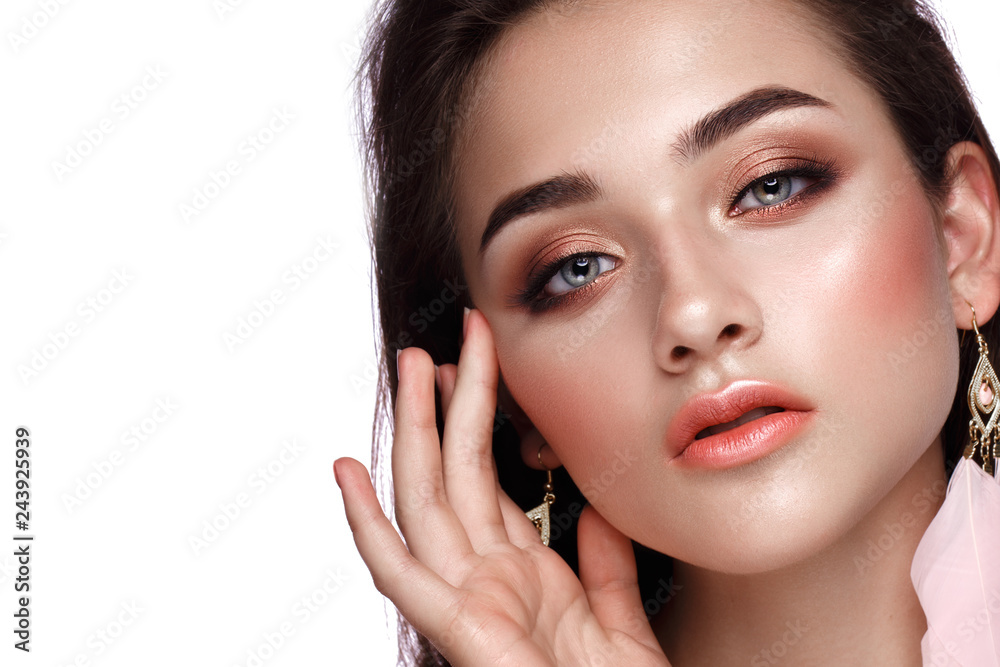 Beautiful girl with classic evening make up. Beauty face. Beautiful girl with classic evening make up. Beauty face.