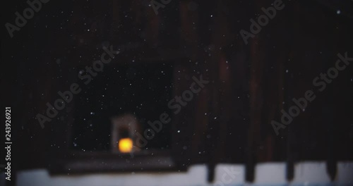 Candle in the window of a rustic barn. Rustic Christmas scenes while testing out the Blackmagic pocket cinema camera 4k