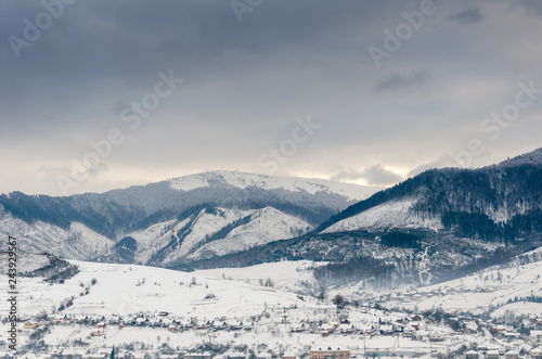 winter landscape, mountains covered with snow, break in winter
