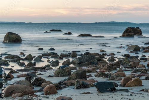 Smoky motion blur rocky Buzzards Bay beach photo