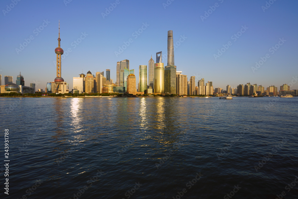 Obraz premium Day view of the modern Pudong skyline seen from the Bund in Shanghai, China