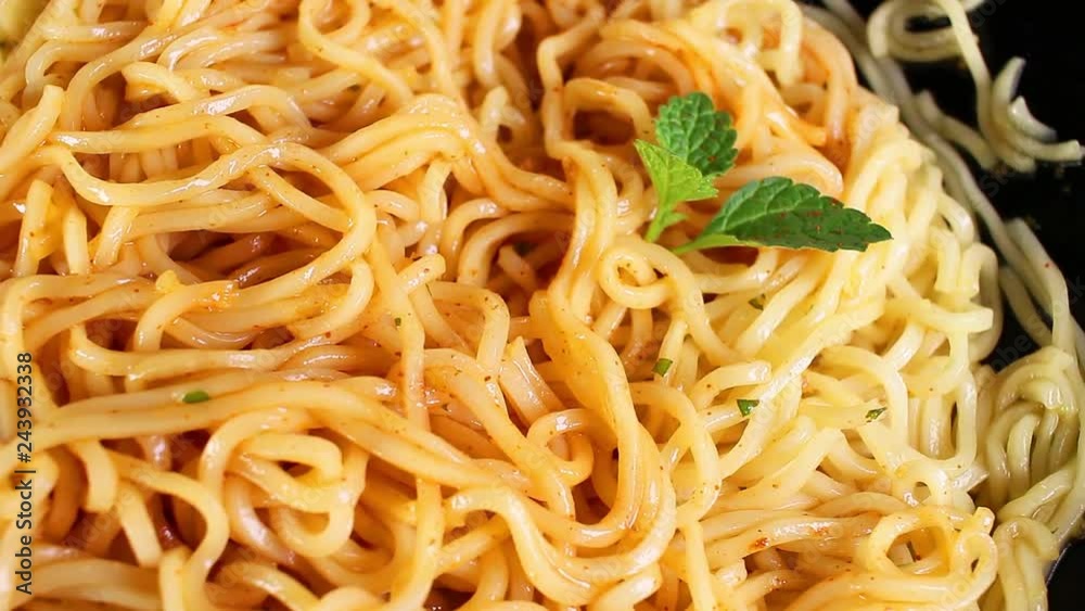 Instant pasta fast food noodles seamless looping background closeup video Instant pasta fast food noodles seamless looping background closeup video