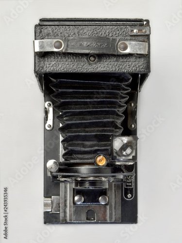 Vintage camera in black on a white background