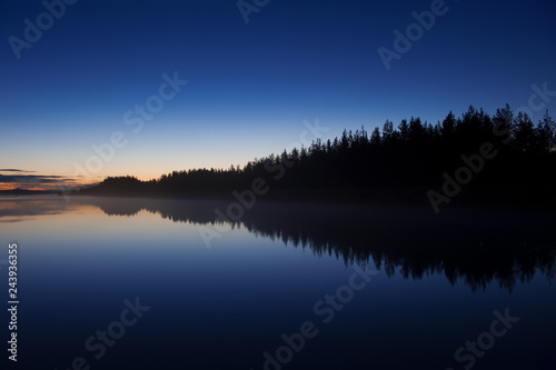 River scenery at summer night in Finland.