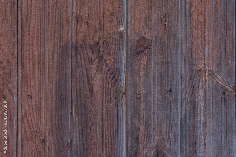 The texture of shabby paint on a wooden wall The texture of shabby paint on a wooden wall