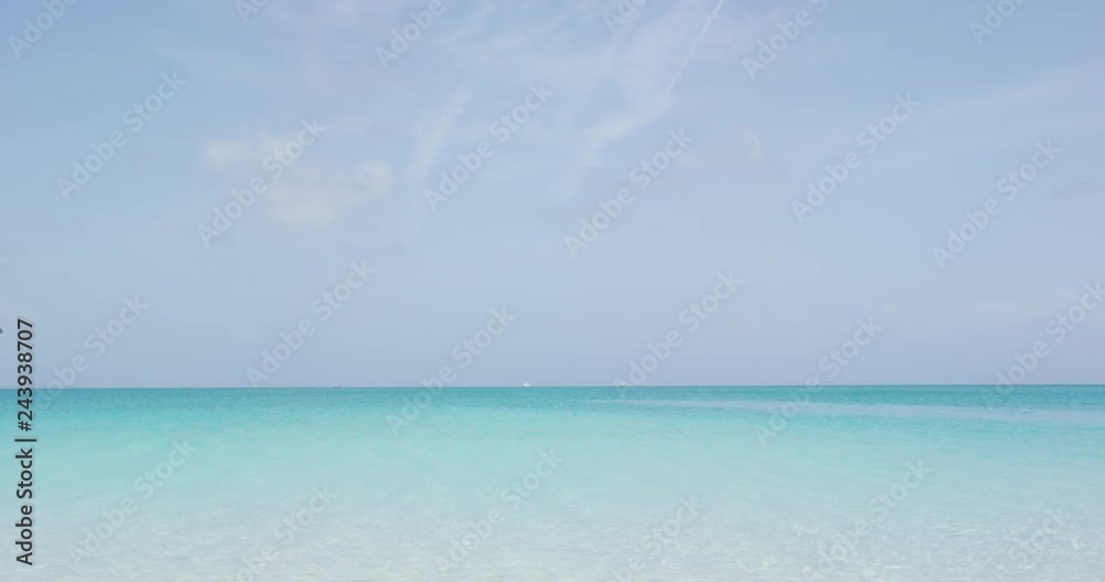 Beach woman in bikini wearing sunglasses and sunhat in travel vacation concept. Pretty girl on luxury island. Beach woman in bikini wearing sunglasses and sunhat in travel vacation concept. Pretty girl on luxury island.