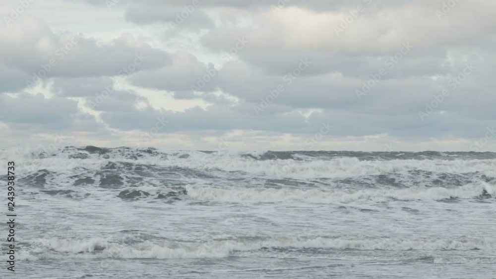 Waves breaking on concrete breakwaters. Sea storm. Waves breaking on concrete breakwaters. Sea storm.