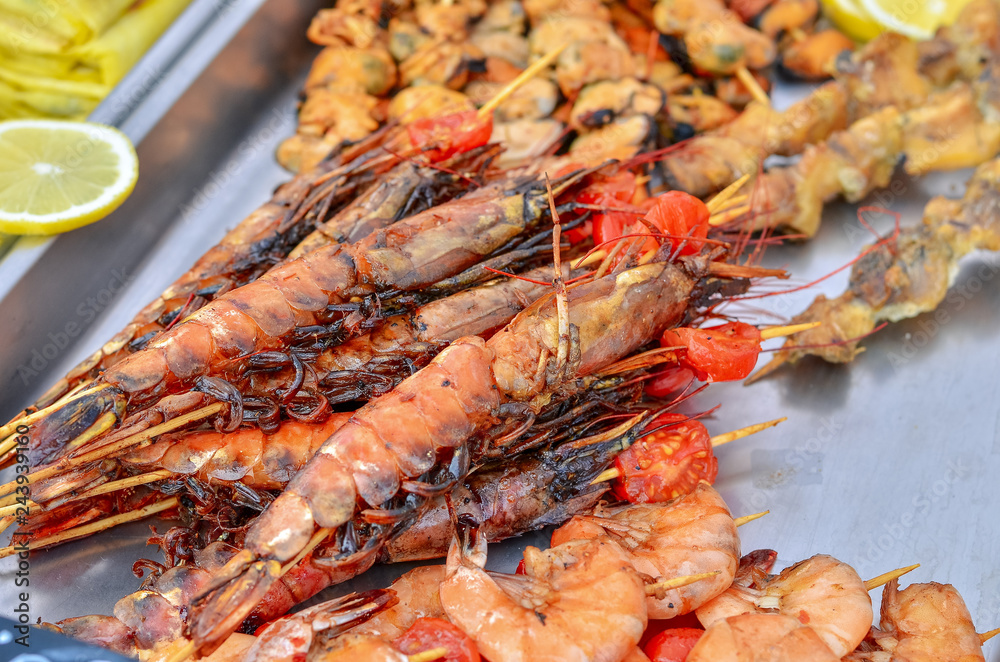 Assorted grilled seafood with big shrimps and mussels