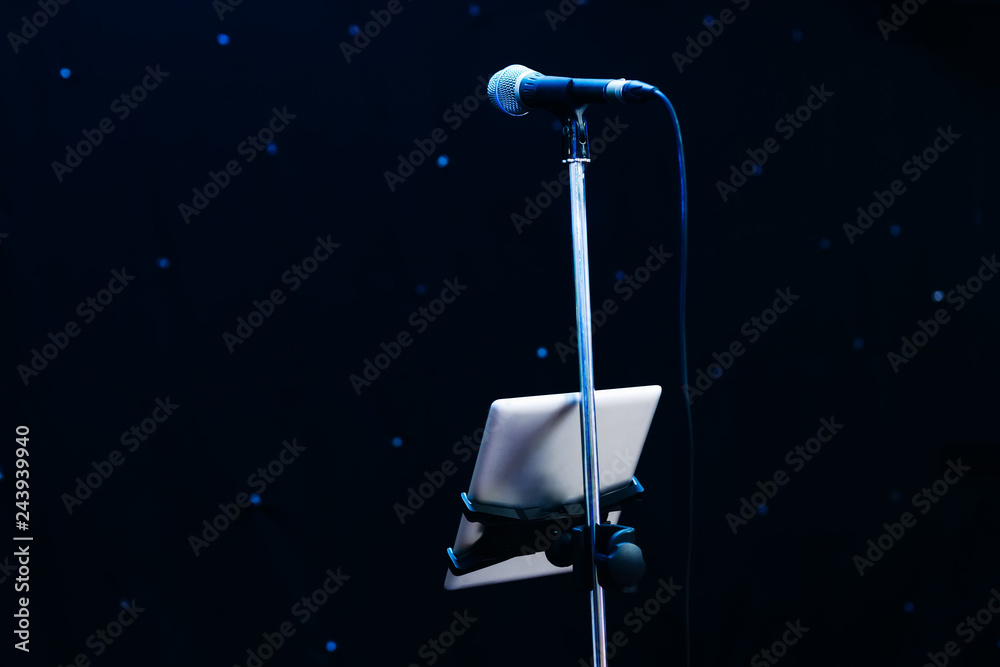 microphone with a stand and a tablet that attaches to the stand microphone with a stand and a tablet that attaches to the stand