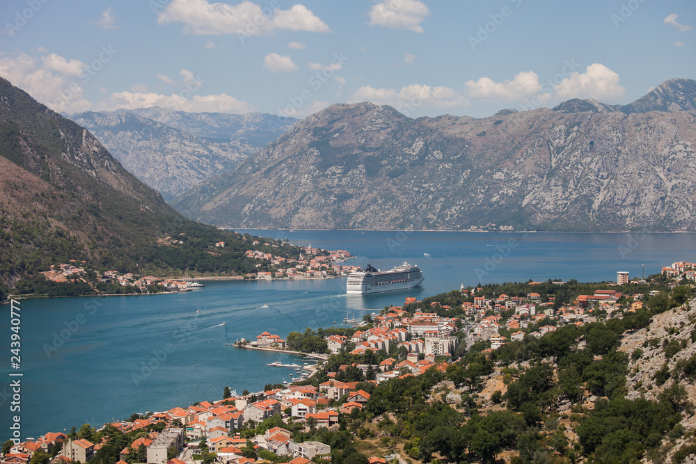 Scenic view of the historic Old Town of Kotor, Kotor Bay and The cruise ship departing from Lovcen Mountain, Montenegro, Balkans