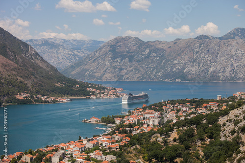 Scenic view of the historic Old Town of Kotor, Kotor Bay and The cruise ship departing from Lovcen Mountain, Montenegro, Balkans