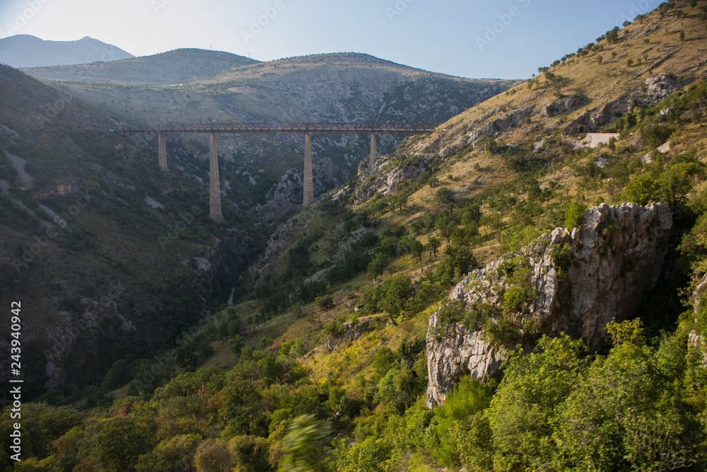 railway bridge, mountain gorges and passes in Montenegro while traveling by rail