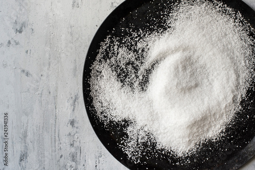 Overhead view of salt on plate