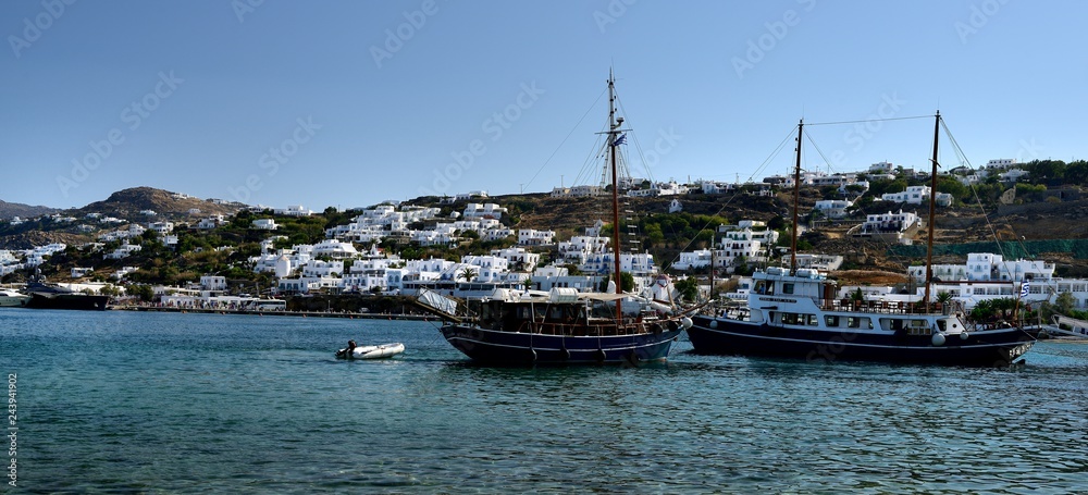 Masted yachts in the harbour of Mykonos
