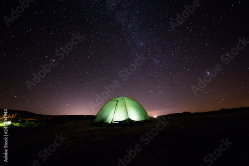 Fototapeta Naklejka Na Ścianę i Meble -  Long exposure of tent camp