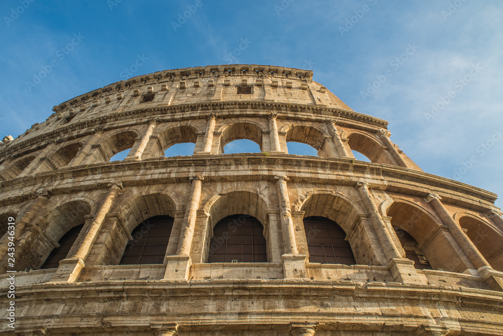 Colosseum in Rome on a sunny day. Italian architecture