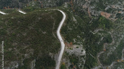 Car driving on a road in the mountains of peloponnese