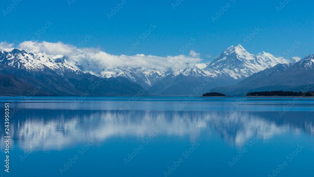 At the head of Lake Pukaki, Mt. Cook / Aoraki is New Zealand’s tallest mountain. Located in the center of the South Island in Canterbury. This is panoramic view from Lake Pukaki and Southern Alps.