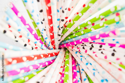 Closeup view of colorful paper straw, selective focus