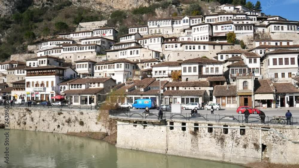 Berat, Albania: river Osum and traditional ottoman houses in Berat (mangalem and gorica district) with his thousand windows, an UNESCO world heritage site in Albania.