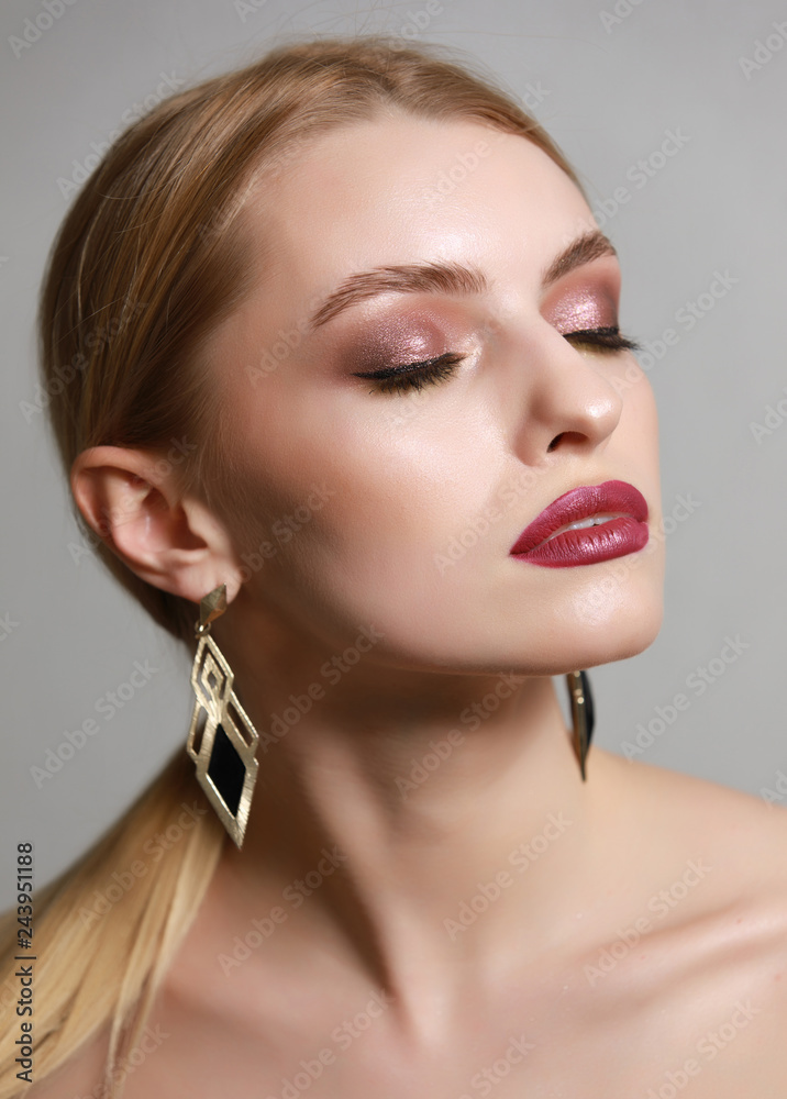 Fototapeta premium Fashion model portrait with beautiful makeup and closed eyes