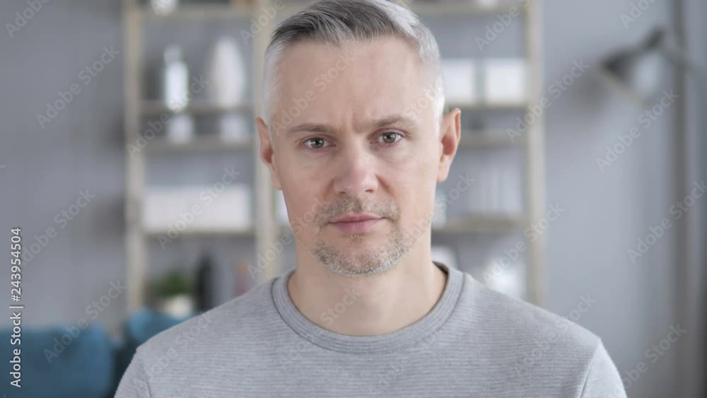 Portrait of Serious Gray Hair Man Looking at Camera Portrait of Serious Gray Hair Man Looking at Camera
