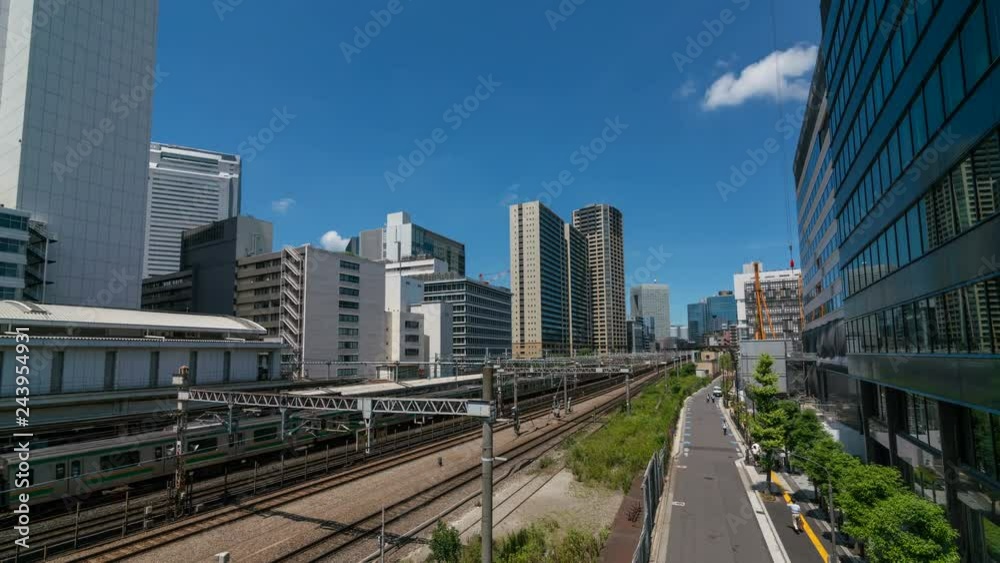 Timelapse of Urban Railroad Tracks in Office District in Tokyo Timelapse of Urban Railroad Tracks in Office District in Tokyo