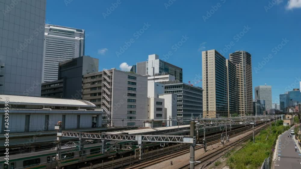 Timelapse of Urban Railroad Tracks in Office District in Tokyo -Pan Right- Timelapse of Urban Railroad Tracks in Office District in Tokyo -Pan Right-