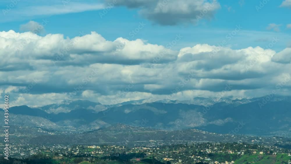 Timelapse of Cloudscape over Mountain Range in Los Angeles -Tilt Up-