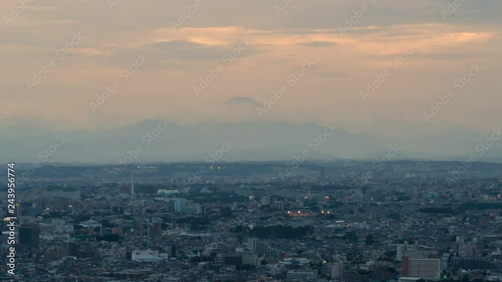 Timelapse of Day to Night Transition of Mt. Fuji over Tokyo -Zoom Out- Timelapse of Day to Night Transition of Mt. Fuji over Tokyo -Zoom Out-